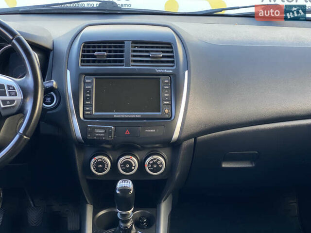 Синий Мицубиси АСХ, объемом двигателя 1.8 л и пробегом 232 тыс. км за 8100 $, фото 19 на Automoto.ua