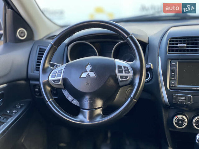 Синий Мицубиси АСХ, объемом двигателя 1.8 л и пробегом 232 тыс. км за 8100 $, фото 18 на Automoto.ua