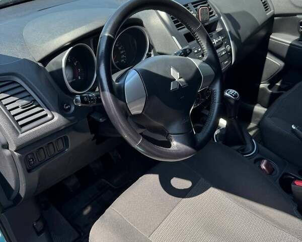 Синий Мицубиси АСХ, объемом двигателя 1.59 л и пробегом 122 тыс. км за 9500 $, фото 13 на Automoto.ua