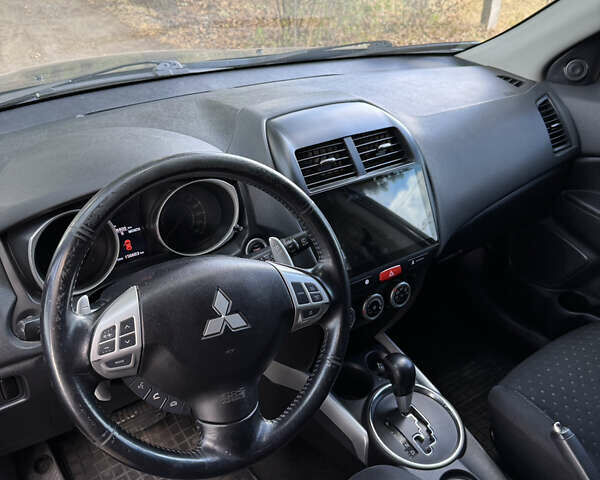 Синій Міцубісі АСХ, об'ємом двигуна 1.8 л та пробігом 156 тис. км за 10300 $, фото 11 на Automoto.ua
