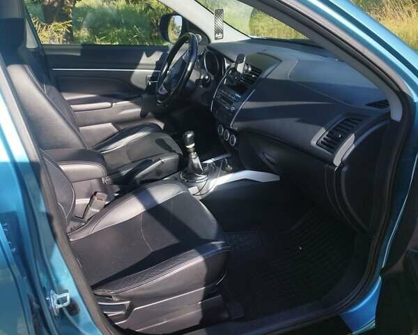Синий Мицубиси АСХ, объемом двигателя 1.8 л и пробегом 258 тыс. км за 9500 $, фото 19 на Automoto.ua