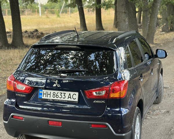 Синій Міцубісі АСХ, об'ємом двигуна 1.8 л та пробігом 156 тис. км за 10300 $, фото 6 на Automoto.ua