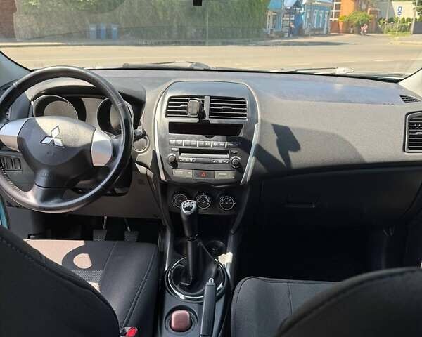 Синий Мицубиси АСХ, объемом двигателя 1.59 л и пробегом 122 тыс. км за 9500 $, фото 14 на Automoto.ua