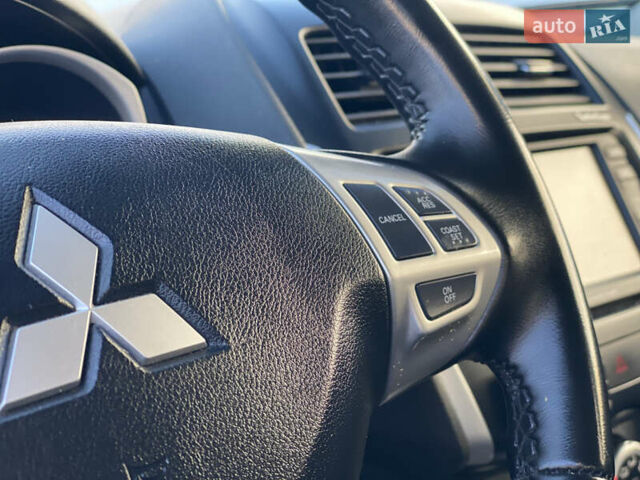 Синий Мицубиси АСХ, объемом двигателя 1.8 л и пробегом 232 тыс. км за 8100 $, фото 38 на Automoto.ua