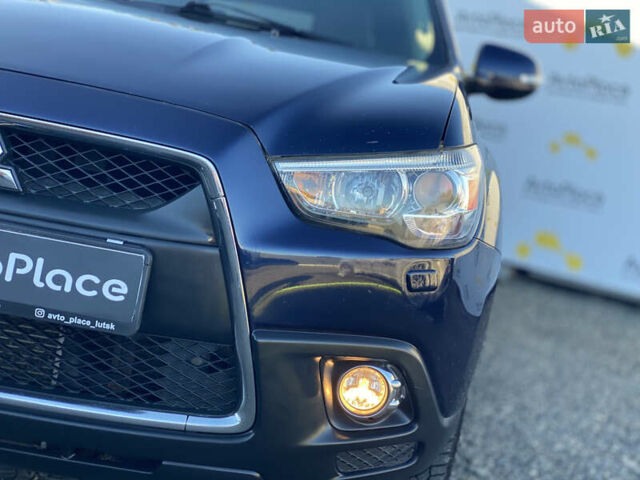 Синий Мицубиси АСХ, объемом двигателя 1.8 л и пробегом 232 тыс. км за 8100 $, фото 73 на Automoto.ua