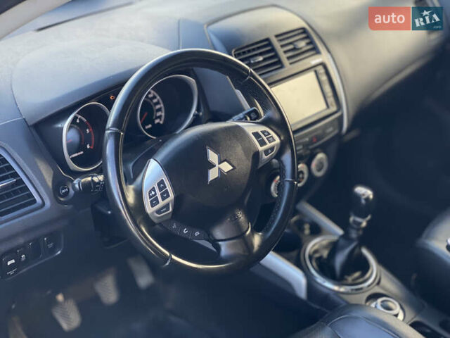 Синий Мицубиси АСХ, объемом двигателя 1.8 л и пробегом 232 тыс. км за 8100 $, фото 40 на Automoto.ua