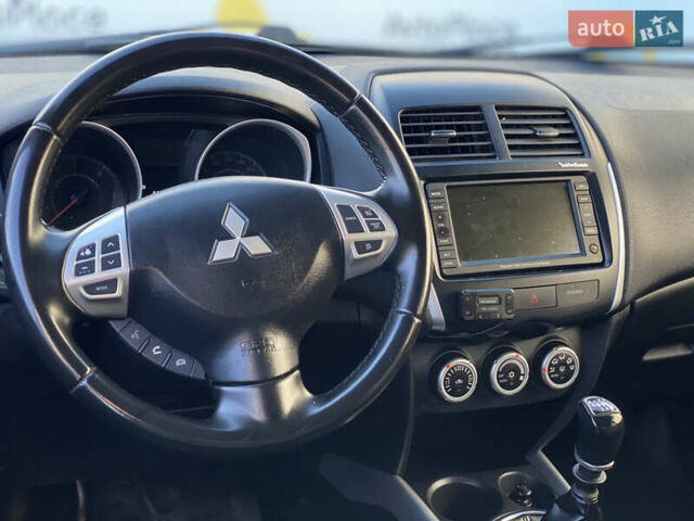 Синий Мицубиси АСХ, объемом двигателя 1.8 л и пробегом 232 тыс. км за 8100 $, фото 20 на Automoto.ua