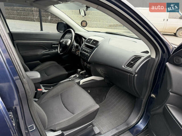 Синий Мицубиси АСХ, объемом двигателя 1.8 л и пробегом 180 тыс. км за 9200 $, фото 33 на Automoto.ua
