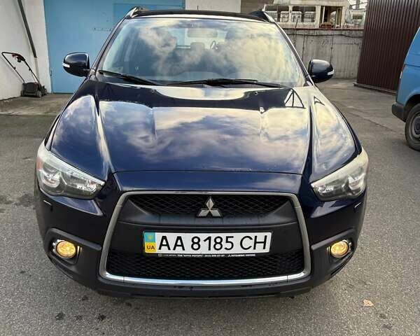 Синий Мицубиси АСХ, объемом двигателя 2 л и пробегом 263 тыс. км за 9500 $, фото 1 на Automoto.ua