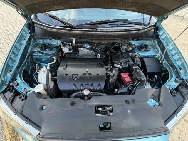 Синий Мицубиси АСХ, объемом двигателя 2 л и пробегом 147 тыс. км за 11500 $, фото 19 на Automoto.ua