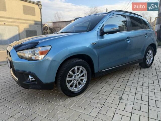 Синий Мицубиси АСХ, объемом двигателя 2 л и пробегом 147 тыс. км за 11500 $, фото 2 на Automoto.ua