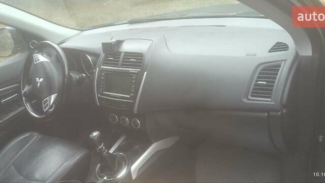 Синий Мицубиси АСХ, объемом двигателя 1.8 л и пробегом 236 тыс. км за 10000 $, фото 3 на Automoto.ua