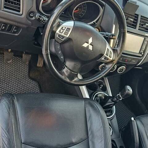 Синий Мицубиси АСХ, объемом двигателя 1.8 л и пробегом 236 тыс. км за 10000 $, фото 6 на Automoto.ua