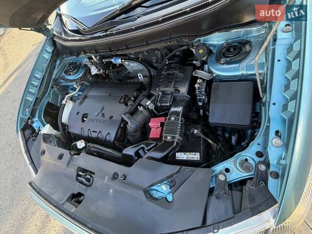 Синий Мицубиси АСХ, объемом двигателя 2 л и пробегом 147 тыс. км за 11500 $, фото 19 на Automoto.ua