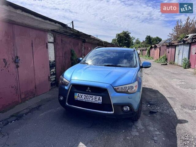 Синий Мицубиси АСХ, объемом двигателя 2 л и пробегом 300 тыс. км за 9300 $, фото 3 на Automoto.ua