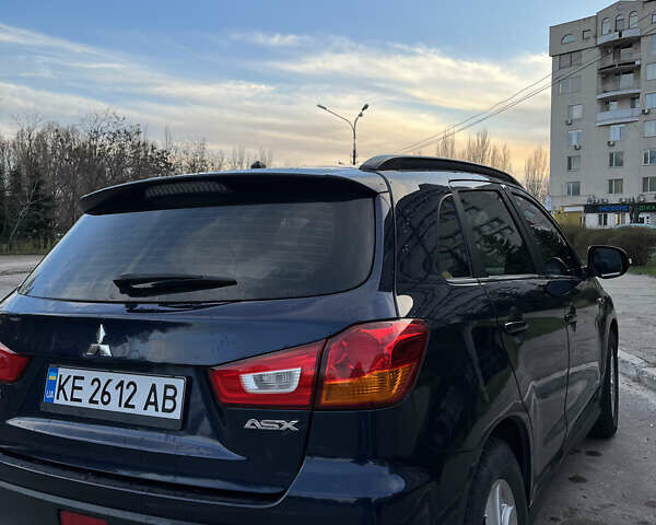 Синій Міцубісі АСХ, об'ємом двигуна 2 л та пробігом 242 тис. км за 9999 $, фото 5 на Automoto.ua