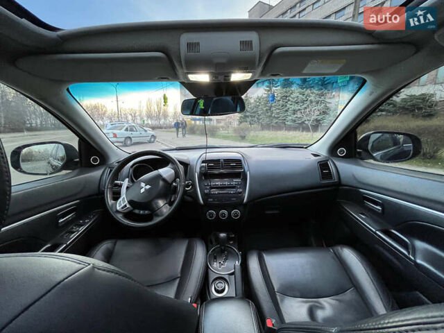 Синій Міцубісі АСХ, об'ємом двигуна 2 л та пробігом 242 тис. км за 9999 $, фото 8 на Automoto.ua