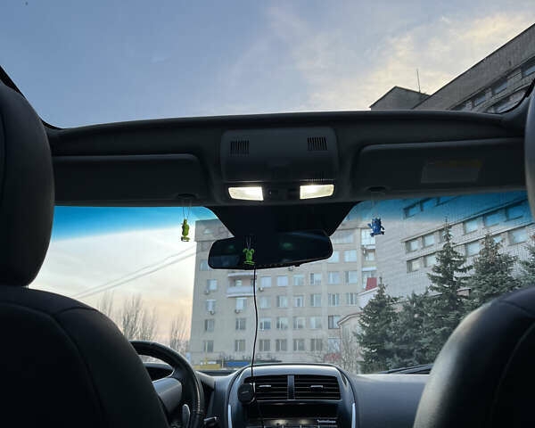 Синій Міцубісі АСХ, об'ємом двигуна 2 л та пробігом 242 тис. км за 9999 $, фото 12 на Automoto.ua