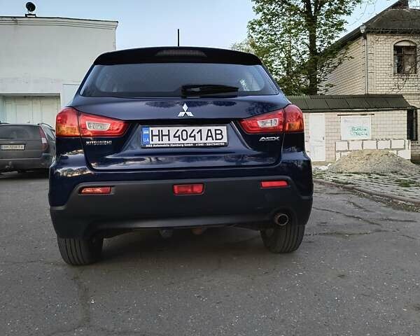 Синий Мицубиси АСХ, объемом двигателя 1.8 л и пробегом 212 тыс. км за 10450 $, фото 7 на Automoto.ua