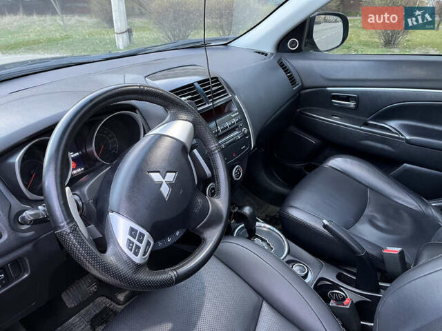 Синій Міцубісі АСХ, об'ємом двигуна 2 л та пробігом 242 тис. км за 9999 $, фото 10 на Automoto.ua