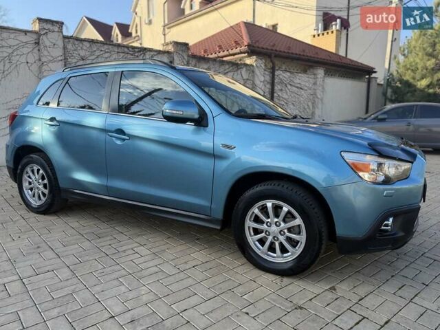 Синий Мицубиси АСХ, объемом двигателя 2 л и пробегом 147 тыс. км за 11500 $, фото 13 на Automoto.ua