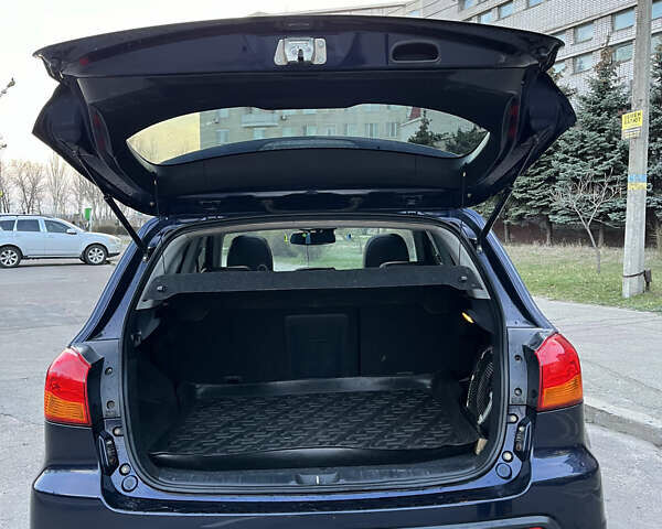 Синій Міцубісі АСХ, об'ємом двигуна 2 л та пробігом 242 тис. км за 9999 $, фото 16 на Automoto.ua