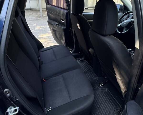 Синий Мицубиси АСХ, объемом двигателя 2 л и пробегом 210 тыс. км за 10500 $, фото 2 на Automoto.ua