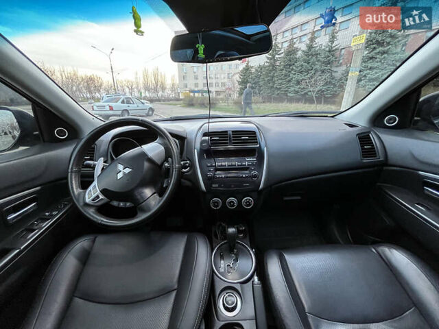 Синій Міцубісі АСХ, об'ємом двигуна 2 л та пробігом 242 тис. км за 9999 $, фото 9 на Automoto.ua