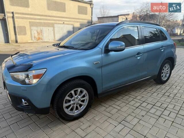 Синий Мицубиси АСХ, объемом двигателя 2 л и пробегом 147 тыс. км за 11500 $, фото 6 на Automoto.ua