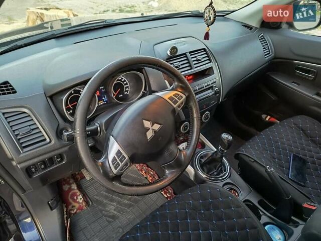 Синий Мицубиси АСХ, объемом двигателя 1.8 л и пробегом 212 тыс. км за 10450 $, фото 13 на Automoto.ua