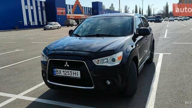 Синій Міцубісі АСХ, об'ємом двигуна 1.59 л та пробігом 188 тис. км за 10200 $, фото 16 на Automoto.ua