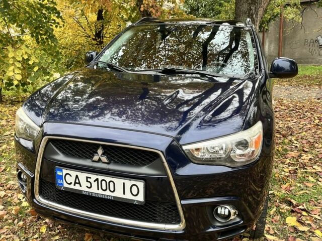 Синий Мицубиси АСХ, объемом двигателя 2 л и пробегом 234 тыс. км за 9900 $, фото 1 на Automoto.ua