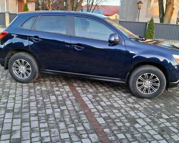 Синий Мицубиси АСХ, объемом двигателя 1.59 л и пробегом 189 тыс. км за 8500 $, фото 26 на Automoto.ua