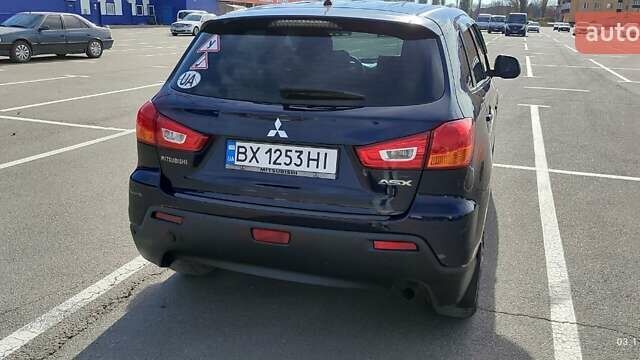 Синій Міцубісі АСХ, об'ємом двигуна 1.59 л та пробігом 188 тис. км за 10200 $, фото 13 на Automoto.ua