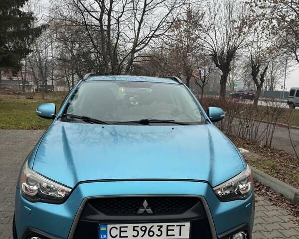 Синий Мицубиси АСХ, объемом двигателя 2 л и пробегом 157 тыс. км за 11400 $, фото 2 на Automoto.ua