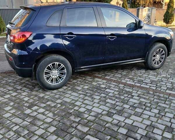 Синий Мицубиси АСХ, объемом двигателя 1.59 л и пробегом 189 тыс. км за 8500 $, фото 13 на Automoto.ua