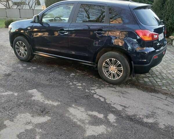 Синий Мицубиси АСХ, объемом двигателя 1.59 л и пробегом 189 тыс. км за 8500 $, фото 12 на Automoto.ua