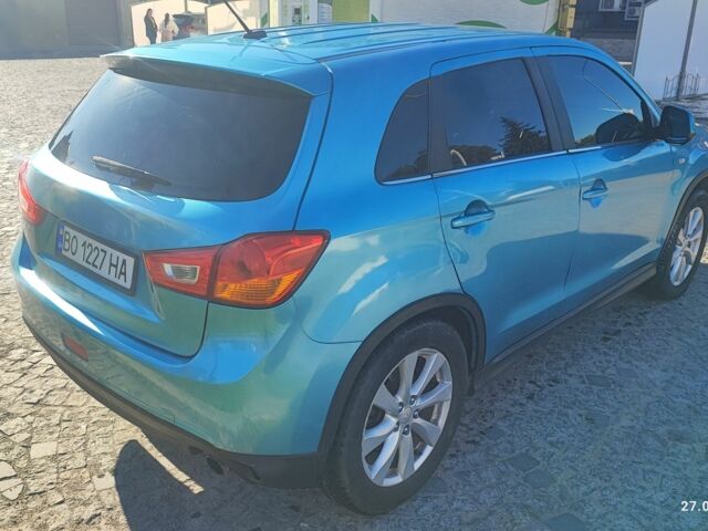 Синій Міцубісі АСХ, об'ємом двигуна 2 л та пробігом 160 тис. км за 8800 $, фото 5 на Automoto.ua
