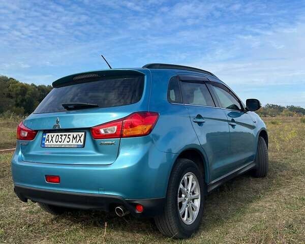 Синий Мицубиси АСХ, объемом двигателя 2 л и пробегом 140 тыс. км за 12500 $, фото 28 на Automoto.ua