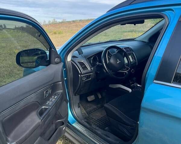 Синий Мицубиси АСХ, объемом двигателя 2 л и пробегом 140 тыс. км за 12500 $, фото 22 на Automoto.ua
