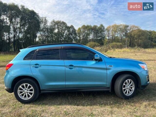 Синий Мицубиси АСХ, объемом двигателя 2 л и пробегом 140 тыс. км за 12500 $, фото 17 на Automoto.ua