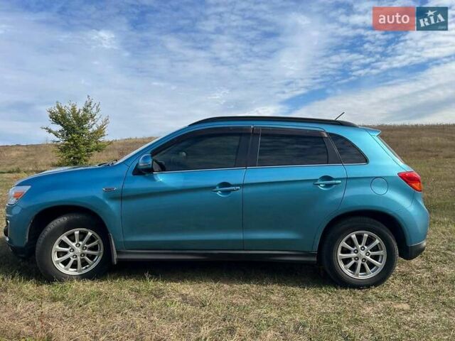 Синий Мицубиси АСХ, объемом двигателя 2 л и пробегом 140 тыс. км за 12500 $, фото 16 на Automoto.ua