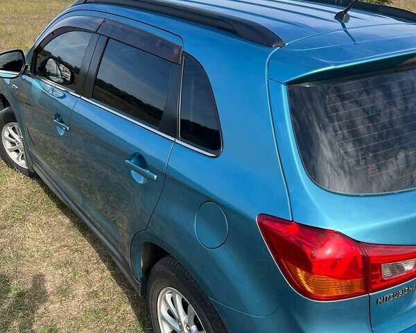 Синий Мицубиси АСХ, объемом двигателя 2 л и пробегом 140 тыс. км за 12500 $, фото 15 на Automoto.ua