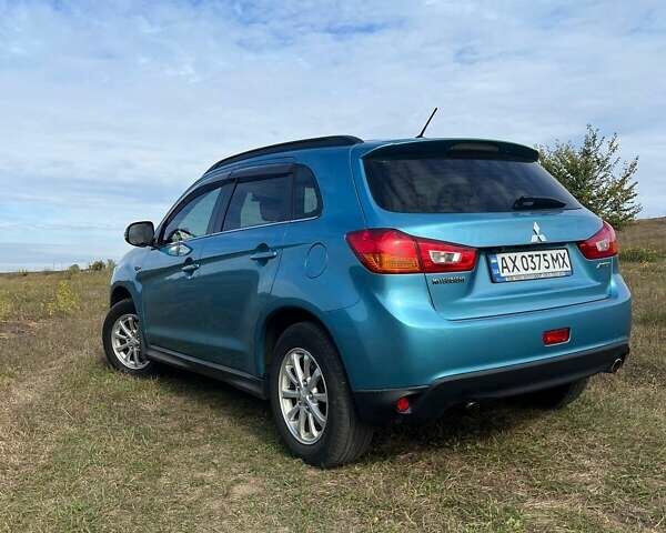 Синий Мицубиси АСХ, объемом двигателя 2 л и пробегом 140 тыс. км за 12500 $, фото 29 на Automoto.ua
