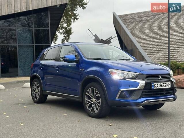 Синій Міцубісі АСХ, об'ємом двигуна 2 л та пробігом 91 тис. км за 12500 $, фото 11 на Automoto.ua