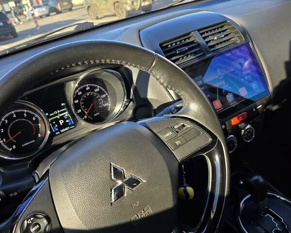 Синий Мицубиси АСХ, объемом двигателя 1.59 л и пробегом 169 тыс. км за 12600 $, фото 8 на Automoto.ua