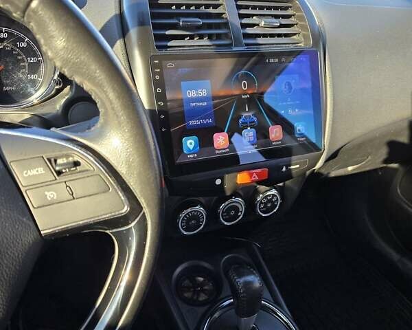 Синий Мицубиси АСХ, объемом двигателя 1.59 л и пробегом 169 тыс. км за 12600 $, фото 7 на Automoto.ua