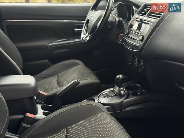 Синій Міцубісі АСХ, об'ємом двигуна 2 л та пробігом 91 тис. км за 12500 $, фото 26 на Automoto.ua