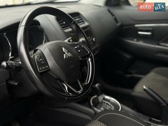 Синій Міцубісі АСХ, об'ємом двигуна 2 л та пробігом 91 тис. км за 12500 $, фото 18 на Automoto.ua