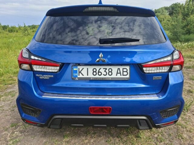 Синий Мицубиси АСХ, объемом двигателя 2 л и пробегом 138 тыс. км за 15000 $, фото 2 на Automoto.ua